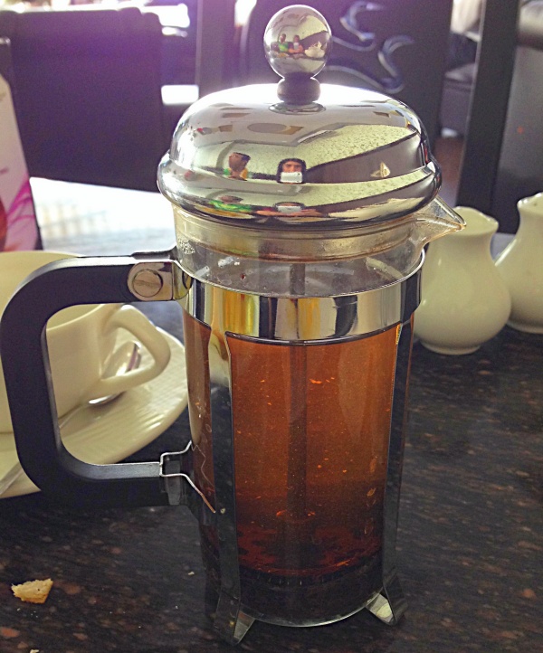 Monk's Blend Tea in a French Press at Aroma's Cafe Mumbai